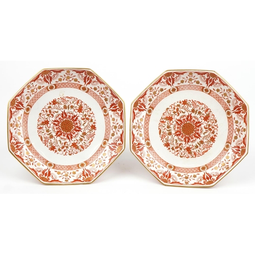 1475 - Pair of Minton comports decorated with flowers having octagonal dishes, each 23.5cm in diameter