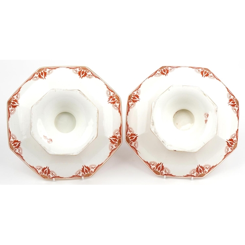 1475 - Pair of Minton comports decorated with flowers having octagonal dishes, each 23.5cm in diameter