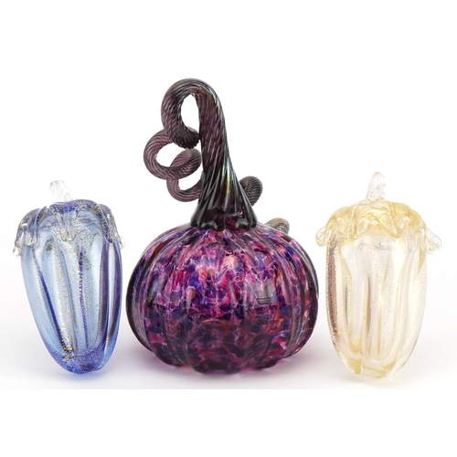 426 - Two Murano glass vegetables and an iridescent glass vegetable, the largest 14cm high