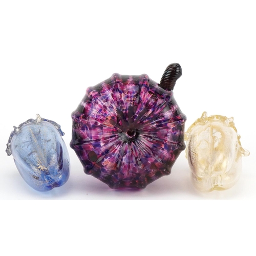 426 - Two Murano glass vegetables and an iridescent glass vegetable, the largest 14cm high