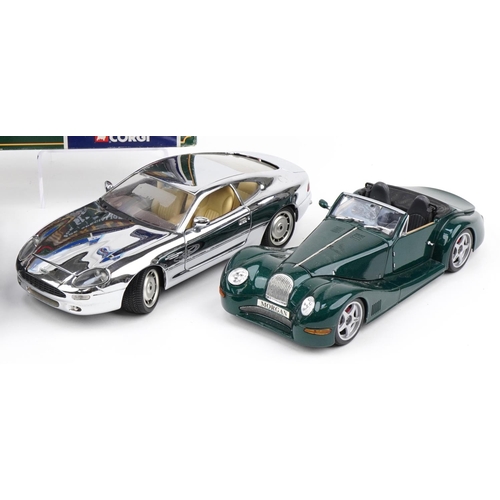 1549 - Seven large diecast vehicles, two with boxes including Aston Martin DB7, Morgan Aero by Maisto and E... 