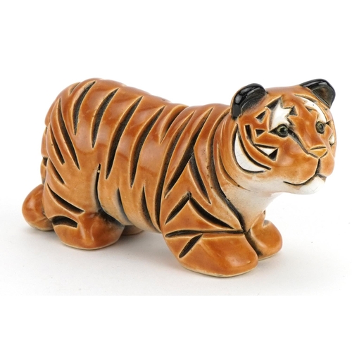 1298 - Mid century style stylised pottery tiger, incised marks to the base, 13.5cm in length