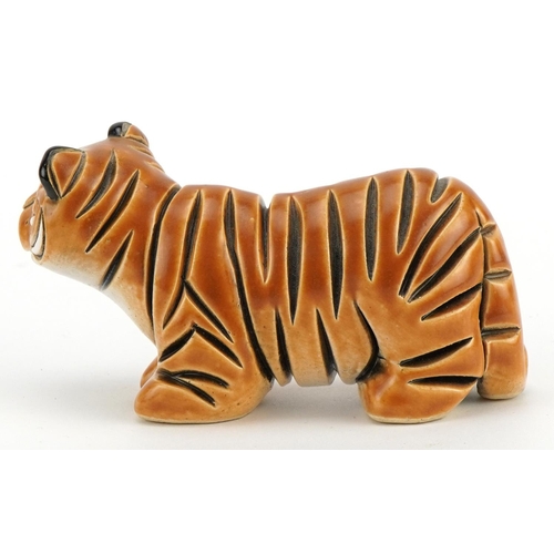 1298 - Mid century style stylised pottery tiger, incised marks to the base, 13.5cm in length