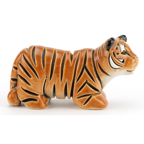 1298 - Mid century style stylised pottery tiger, incised marks to the base, 13.5cm in length