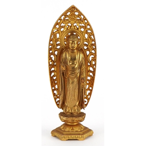 523 - Japanese gilt bronze figure of Amida Nyorai Buddha, character marks to the reverse, 16cm high