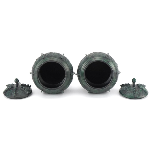 465 - Pair of Japanese verdigris bronze archaic style vessels and covers, character marks to the bases, ea... 