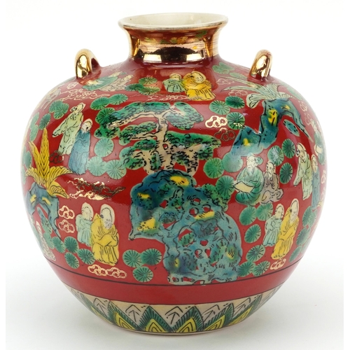 1530 - Japanese Kutani porcelain vase with twin handles decorated with elders in a landscape, 23cm high