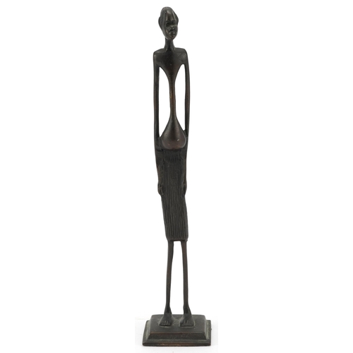 1403 - Indian bronze figure of a tribesman, 30.5cm high