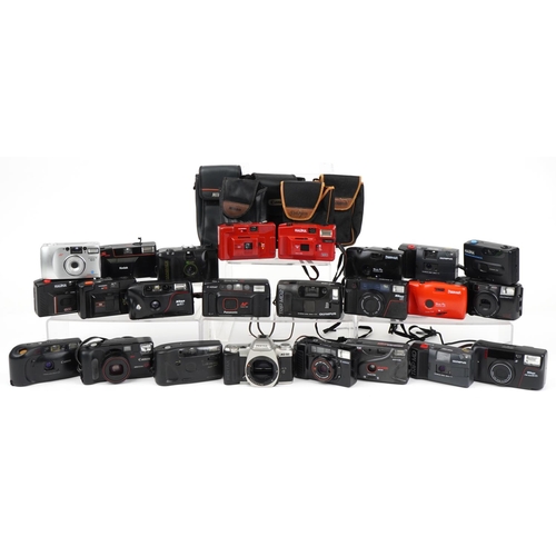 1357 - Collection of vintage film cameras including Canon and Nikon