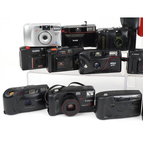 1357 - Collection of vintage film cameras including Canon and Nikon