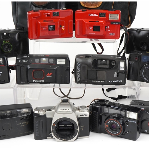 1357 - Collection of vintage film cameras including Canon and Nikon