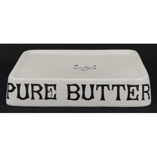 531 - Agricultural interest Pure Butter ceramic stand, 34cm wide