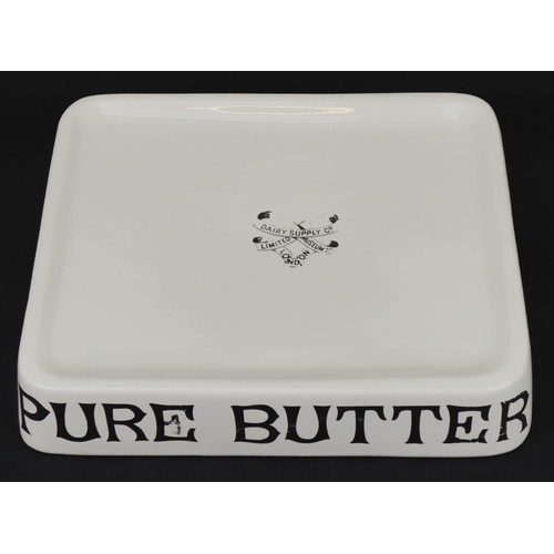 531 - Agricultural interest Pure Butter ceramic stand, 34cm wide