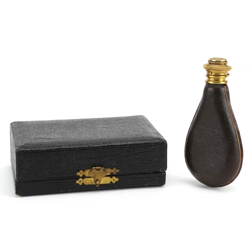 707 - Military interest scent bottle in the form of a powder flask with gilt metal hinged lid housed in a ... 