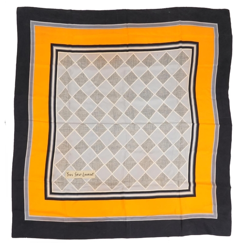 343 - Two Yves Saint Laurent silk scarves including a checked example, the checked example 82.5cm x 85cm