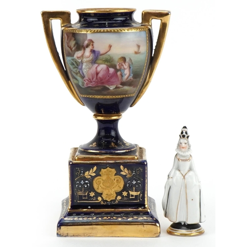 478 - Vienna, Austrian miniature porcelain figure of a female Pierrot and an urn vase hand painted with sc... 