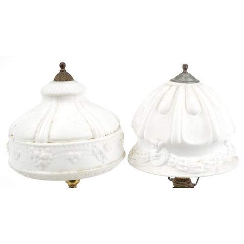 402 - Pair of early 20th century brass table lamps with white opaque glass shades, the largest 49.5cm high