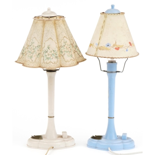 1566 - Two Art Deco plastic table lamps with shades including one hand painted with flowers, the largest 49... 