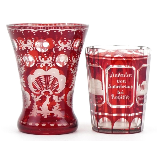 479 - Bohemian ruby overlaid glass vase and mug etched with German towns, the largest 13cm high