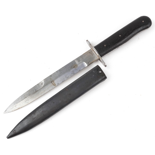 729 - German military interest boot knife with scabbard and steel blade impressed WOA 25, 30cm in length