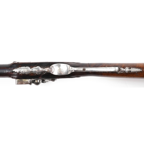 701 - Good 19th century French flintlock sporting gun with unmarked silver butt and foliate inlay, 126cm i... 