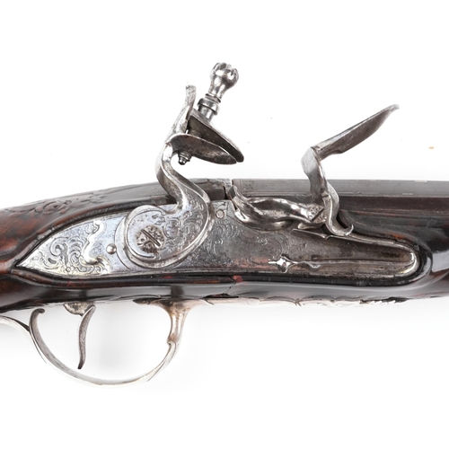 701 - Good 19th century French flintlock sporting gun with unmarked silver butt and foliate inlay, 126cm i... 