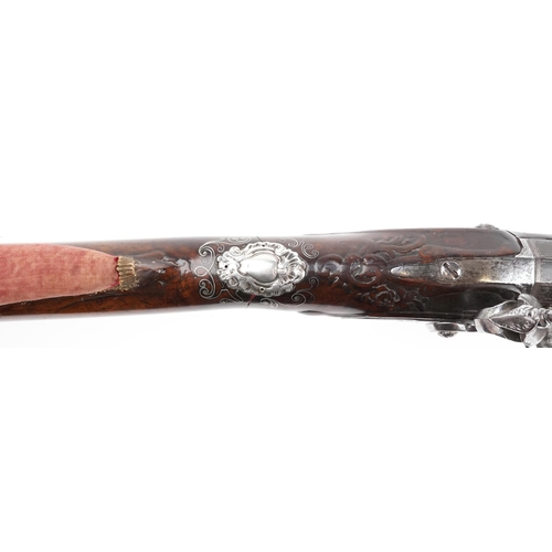 701 - Good 19th century French flintlock sporting gun with unmarked silver butt and foliate inlay, 126cm i... 