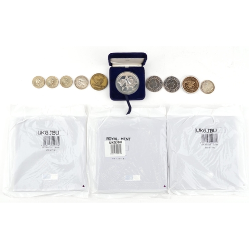 824 - British and world coinage, some silver including Arab Banking Corporation Bahrain silver medallion w... 