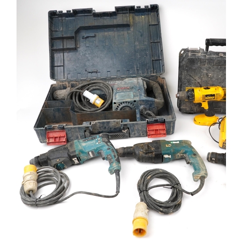 1560 - Electric power tools including DeWalt drills Bosch and Makita hammer drills