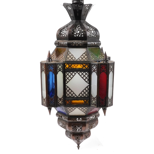 503 - Moroccan Moorish style bronzed hanging lantern with coloured glass panels, 52cm high