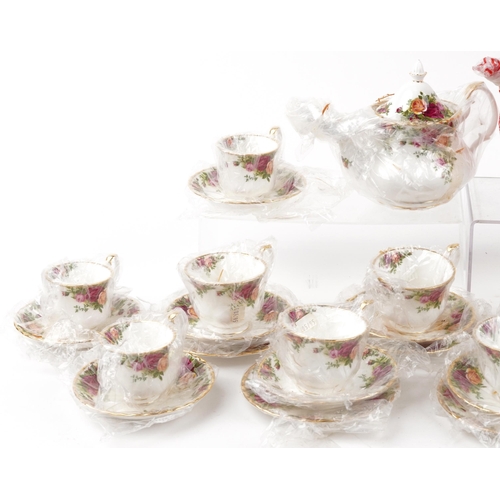 1308 - As new Royal Albert Old Country Roses twelve place tea and coffee service, the coffee pot 20cm high