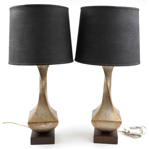 1587 - Pair of contemporary gilt painted twisted table lamps with shades, each 87cm high