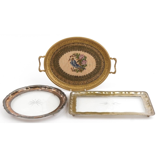 1418 - Three metal and glass trays comprising a good quality French style gilt brass twin handled example a... 