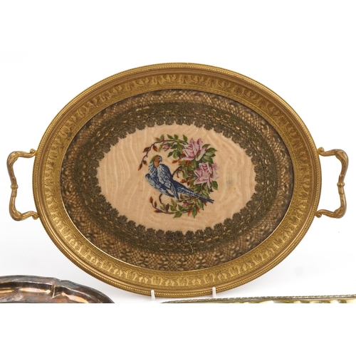 1418 - Three metal and glass trays comprising a good quality French style gilt brass twin handled example a... 