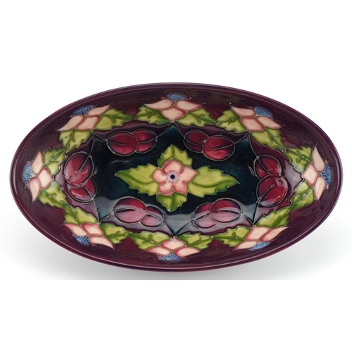 191 - Moorcroft pottery oval dish hand painted in the Morello pattern, 23cm wide