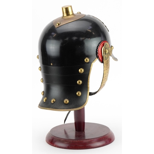 689 - German military interest re-enactment pickelhaube on hardwood stand, overall 39cm high