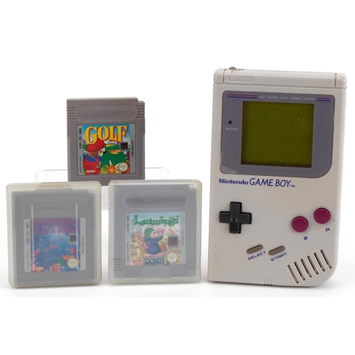 Vintage Nintendo Gameboy with three games comprising Golf, Tetras and Lemmings