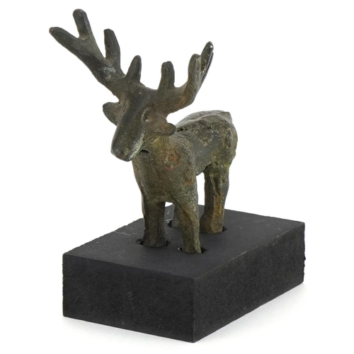 1763 - Greek style bronze figure of a moose on painted stand, overall 11.5cm high