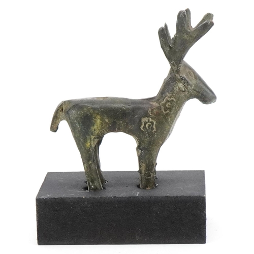 1763 - Greek style bronze figure of a moose on painted stand, overall 11.5cm high