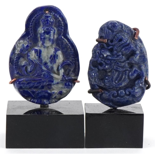 1632 - Two Chinese lapis lazuli panels carved with a figure of Buddha and dragon, each raised on stands, th... 