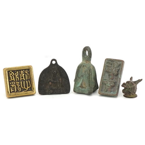 1443 - Chinese bronzes including two seals and an archaic style weight, the largest 6.5cm high