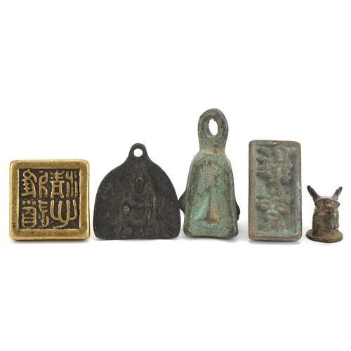 1443 - Chinese bronzes including two seals and an archaic style weight, the largest 6.5cm high