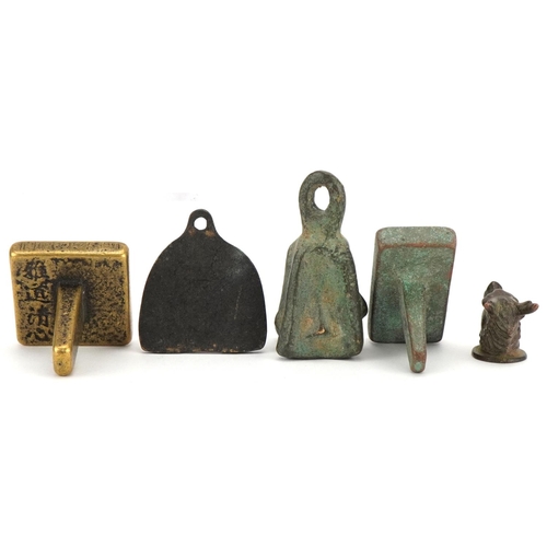 1443 - Chinese bronzes including two seals and an archaic style weight, the largest 6.5cm high