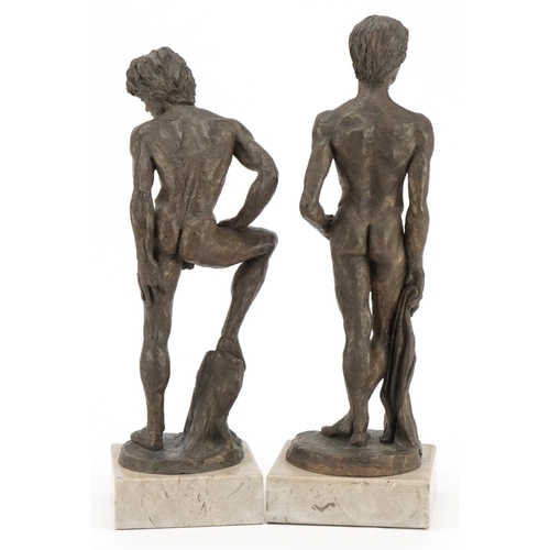 3 - Neil Godfrey 1988, pair of contemporary cold cast bronze figures of standing nude males raised on sq... 