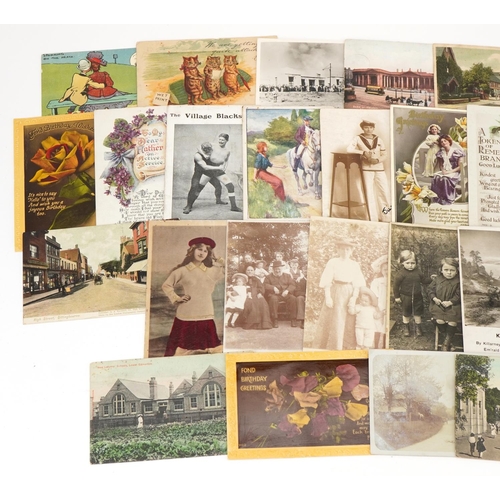 932 - Topographical, greetings and social history postcards including The Village Blacksmith and Denton st... 