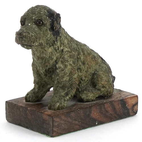 87A - 19th/20th century cold painted bronze seated dog raised on an exotic wood base, possibly Austrian, 1... 