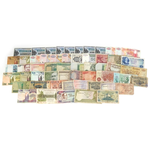 877 - Collection of world banknotes including Pakistan and Jamaica