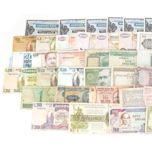 877 - Collection of world banknotes including Pakistan and Jamaica