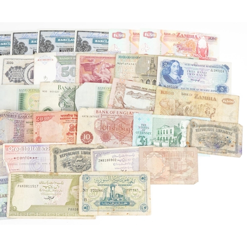 877 - Collection of world banknotes including Pakistan and Jamaica