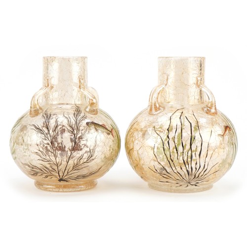 193 - Moser, pair of Bohemian iridescent crackle glass vases with four handles hand painted with fish amon... 